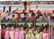 Semarak Hardiknas 2026, Keluarga Besar SMPN 37 Makassar Tampil Membanggakan dengan Busana Adat Sulawesi Selatan Menulis